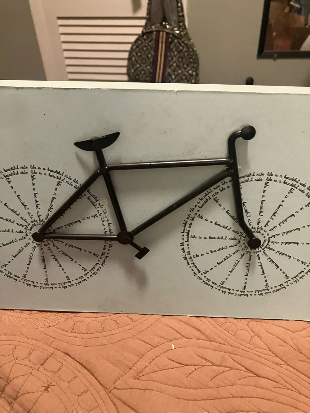Black Metal Wall Art With a Minimalist Bicycle Silhouette